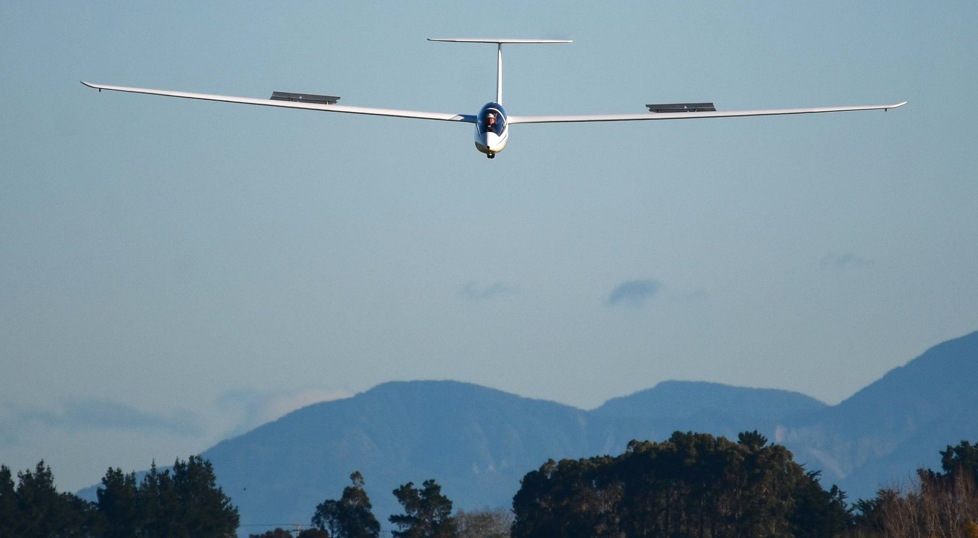 glider on final approach for landing, with airbrakes deployed